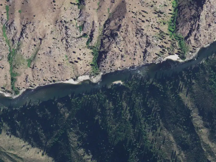 Aerial view of the river around mile 75.7, where Johnson Creek Campsite is on river right