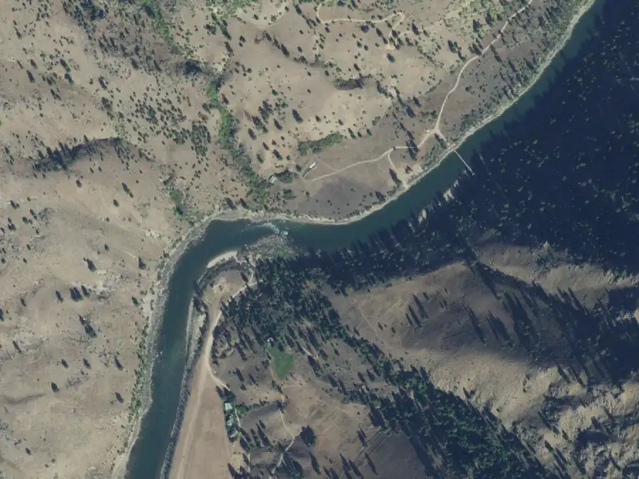 Aerial view of the river around mile 55.4, where Mackay Bar Bridge is on river right