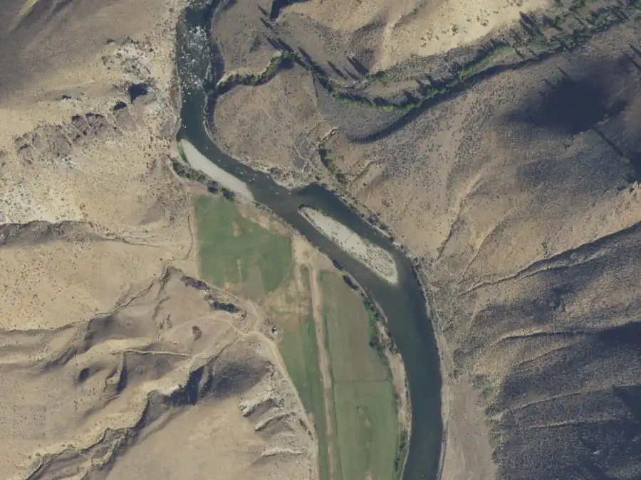 Aerial view of the river around mile 67.3, where Flying B Airport is on river right