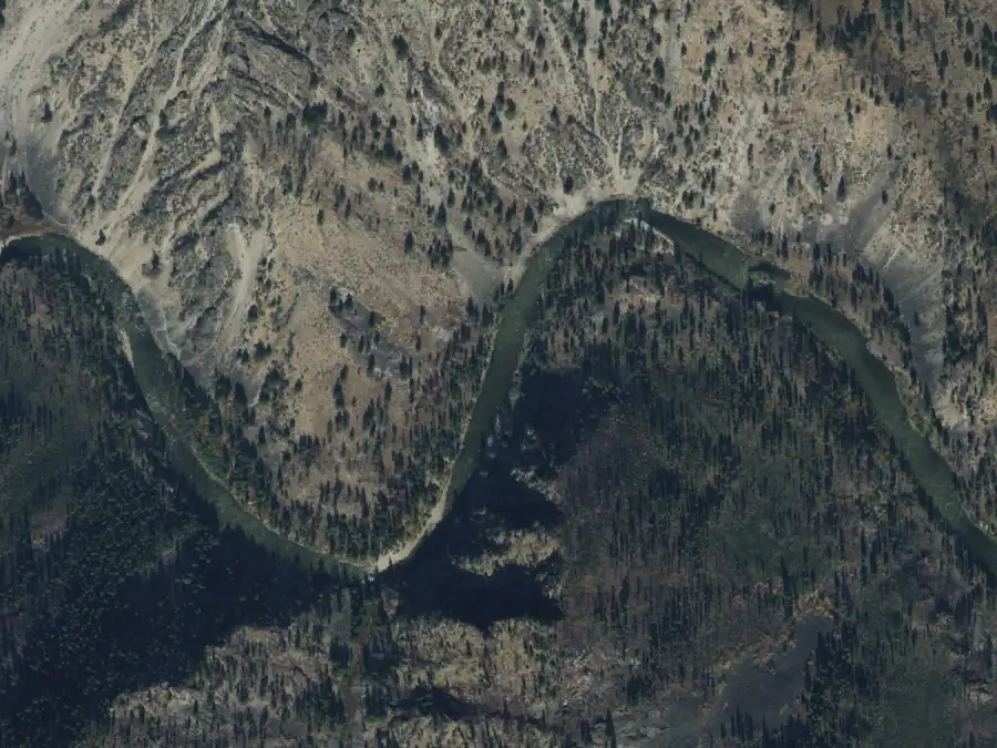 Aerial view of the river around mile 11.8, where Joe Bump Cabin is on river left
